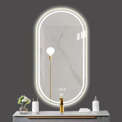 Espejo de baño inteligente LED con baño oval y luces luminosas en plata