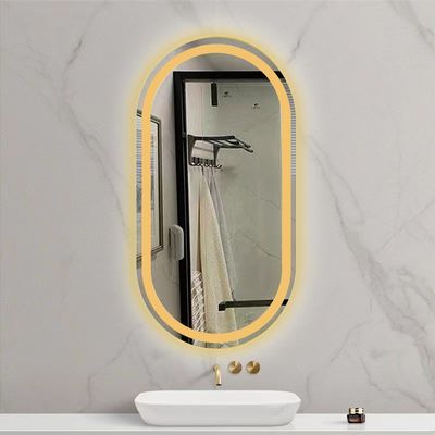 Espejo de baño inteligente LED con baño oval y luces luminosas en plata