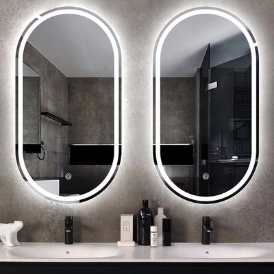Espejo de baño inteligente LED con baño oval y luces luminosas en plata